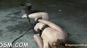 i caged the masked brunette slave and pleasured her with toys