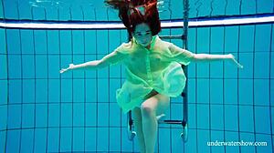 Russian blonde teen nina mohnatka with small tits swims underwater in sexy pornstar scene