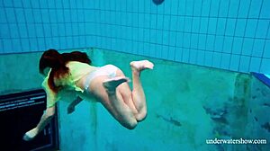 Russian blonde teen nina mohnatka with small tits swims underwater in sexy pornstar scene