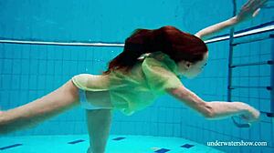 Russian blonde teen nina mohnatka with small tits swims underwater in sexy pornstar scene