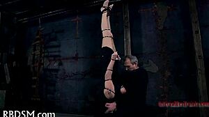 Sadomasochism whipping tube demonstration with intense focus