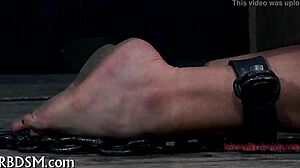 Sadomasochism whipping tube demonstration with intense focus