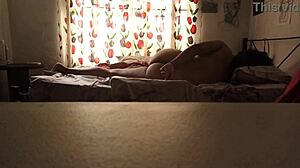 Spying on my cousin resting in her bed. She looks peaceful and unaware.