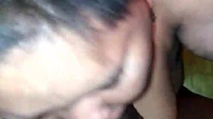 Wife sucks her husband's cock passionately in the bedroom