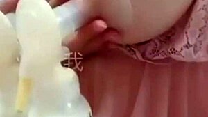 Ping'er Squeezes Her G-Cup Tits for Milk