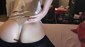 White amateur in satin top and spandex pants deepthroats in POV doggystyle