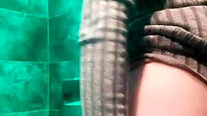 Blonde slut fingers wet pussy in club toilet