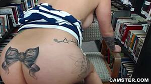 big tits college girl toys herself in library on cam