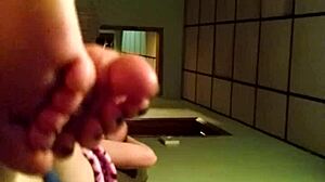 annette b's mama enjoys a sexy footjob from her