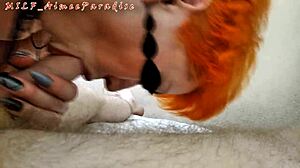 hey, check this sexy redhead sucking a thick cock in her mouth