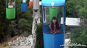 Shy amateur flashes nude in public outdoor setting, exposing old exhibitionist video details