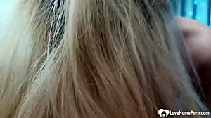 blonde eagerly sucks her guy's throbbing dick