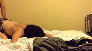 A woman in a mini skirt at a motel.