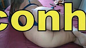 Amateur in red panties teases with anal plug for recording