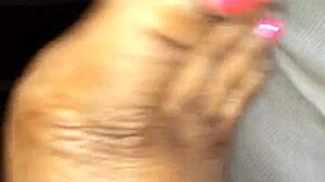 Wife's feet get lotioned into intense footjob fetish action!