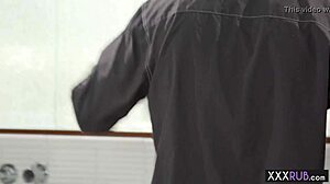 two petite professionals give a sensual massage to a monster cock client in a threesome