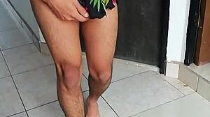 Crossdresser masturbates her cock slowly.