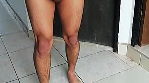 Crossdresser masturbates her cock slowly.