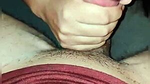 A woman gags on a cock in public, choking while sucking deeply in an outdoor setting.