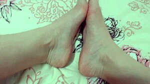 Emme White shows red-nailed feet and pink pussy