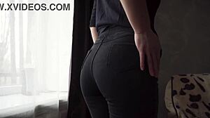 Milf in tight black jeans flashes her white thong whale tail.