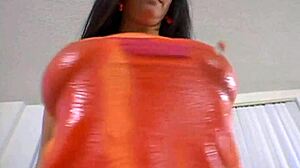 watch this blonde and brunette suck big cocks in a wild threesome with huge asses and tits