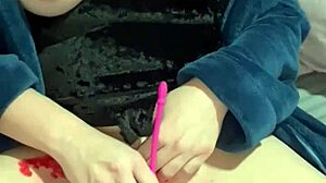 this farmgirl milf is playing with candle wax and a toy in her pussy 😈