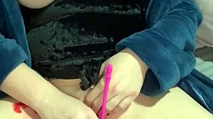 this farmgirl milf is playing with candle wax and a toy in her pussy 😈