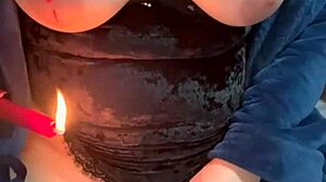 this farmgirl milf is playing with candle wax and a toy in her pussy 😈