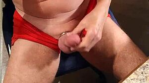 Cock stiffened by sucking tits