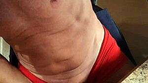 Cock stiffened by sucking tits