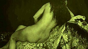 In early 20th century, a hairy babe gives blowjob in vintage porn