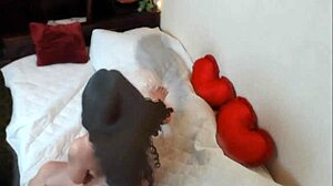 Erotic babydoll strips lingerie in intense striptease with clothes ripped.