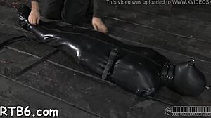 Tied up hottie waits to be fucked hard!