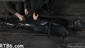 Tied up hottie waits to be fucked hard!