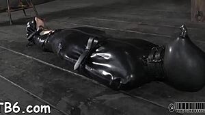 Tied up hottie waits to be fucked hard!