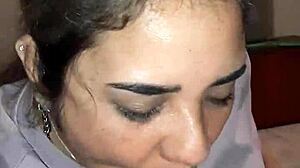 Watch me suck while he stares at my anal video.