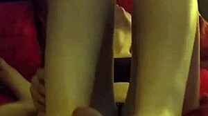 amateur girlfriend gives footjob to friend