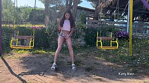 Bad girl squirts wildly while riding outdoor swing