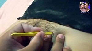 Asian young woman with small tits gets waxed in the bathroom.