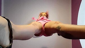 in the bdsm game, the mistress dominates the sissy slut with strapon assfucking