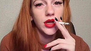 Redhead smoking a cigarette in the park