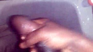 i'm jerking off in the shower, feeling the water run down.