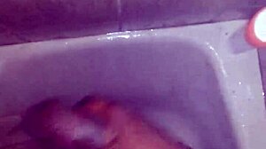 i'm jerking off in the shower, feeling the water run down.