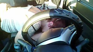 amateur redhead gives deep blowjob in public car setting