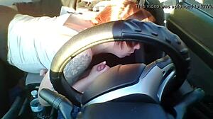 amateur redhead gives deep blowjob in public car setting