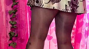 Look at this tease in black pantyhose