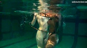 Underwater acrobatics performed by lesbians Irina Barna and Anna Feher