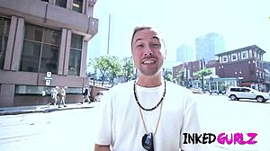 Brunette with glasses and tattoos in a POV scene