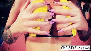 Watch Christy Mack masturbate her tattooed ass in the shower